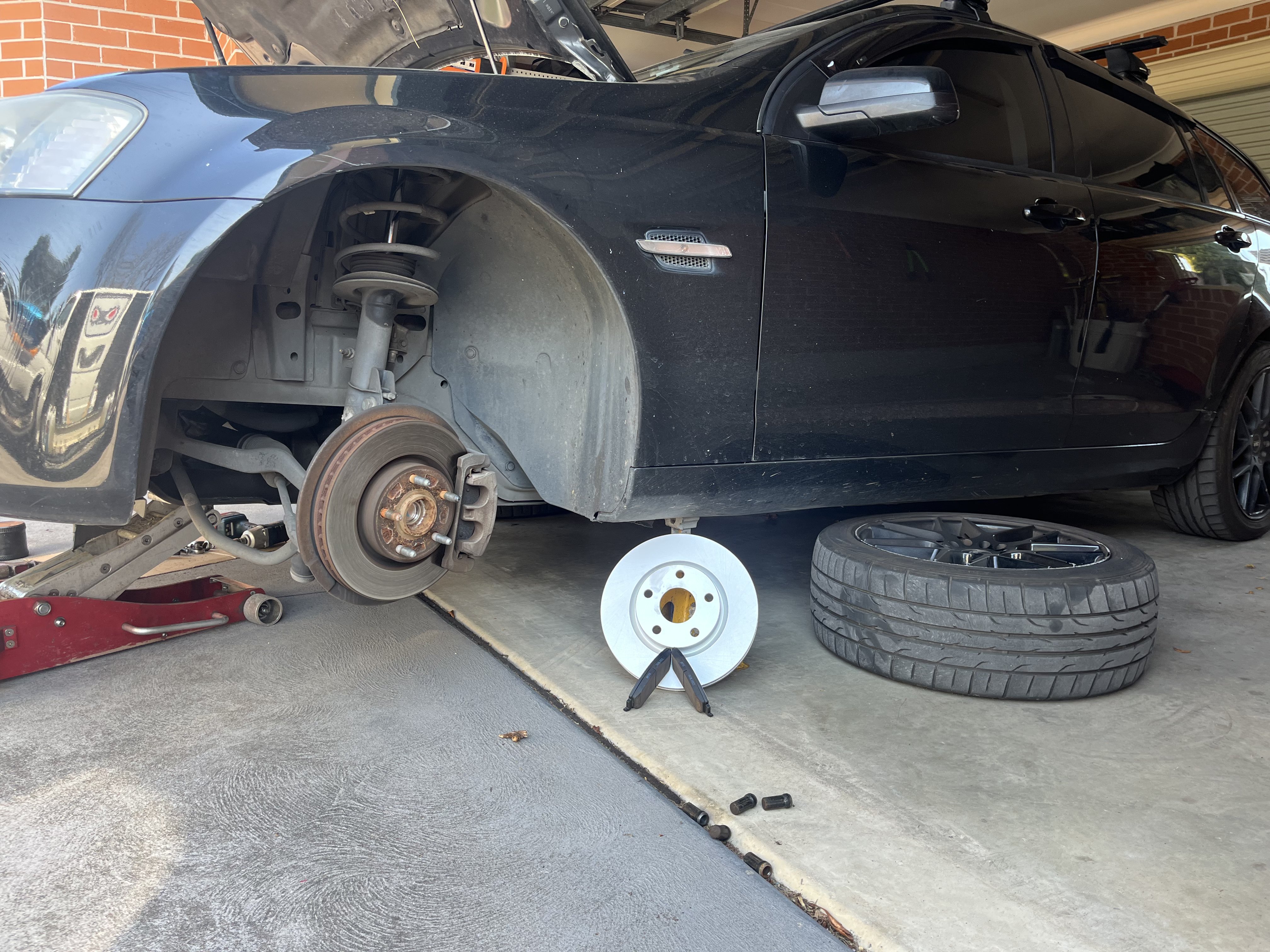 Professional brake service in progress